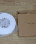 14 Inch White Distressed Round Lazy Susan Real Deal Farmhouse Turntable Smooth Spinning Wooden Serving Tray packaging with bubble wrap.