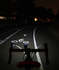 Lumina Micro 900 Front Bike Light And Vmax Plus 150 Rear Light USB Rechargeable Combo Pack illuminating dark bike path