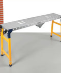Rock Solid Heavy Duty Work Bench With Adjustable Height And Folding Design 1250 Lbs Capacity smooth rolling worktable with yellow legs.