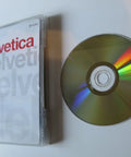 Factory Sealed DVD Documentary On Typography Design That Is A Total Banger For Creative Pros Wanting To Level Up Their Visual Game With Straight Fire Inspiration And Next Level Mastery with a vibrant CD beside it.