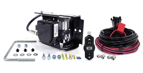 Level That Heavy Tow Rig With Air Spring Kit And Wireless Compressor Featuring Easy Mount Design And Single Path Control To Stop Sag And Trailer Sway While Hauling Loaded Gear In Your 2011 2018 Ram 3500 4WD Truck Running Smooth As Butter Year Round, showing air compressor and installation hardware.