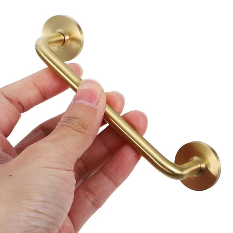 Hand holding Vintage Brass Cabinet Handle With 96mm Centers Double Hole For Kitchen Cabinets And Furniture Retro Wardrobe Door Pulls