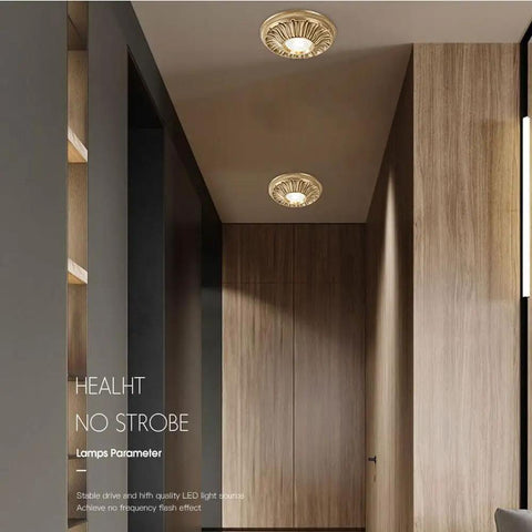 UWYTGF 6 Pack Led Can Lights Retrofit Recessed Lighting illuminating a modern hallway with brass fixtures.