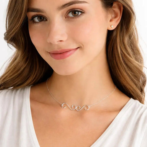 Woman wearing silver swirl necklace showcasing Set Of 4 S Hook Necklace Extenders With Gold And Silver Swirl Hooks Durable Metal Jewelry Extenders For Necklaces And DIY Crafting Tarnish Resistant S Shaped Connectors