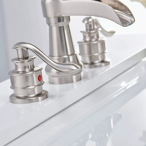 Brushed nickel faucet with two handles on a white sink, not matching Matte Black Widespread Bathroom Faucet 8 Inch Centers With 2 Handles Waterfall Flow 3 Hole Farmhouse Vanity Sink Faucet Pop Up Drain Assembly For Easy Install And Supply Lines Included Commercial Mixer Faucet