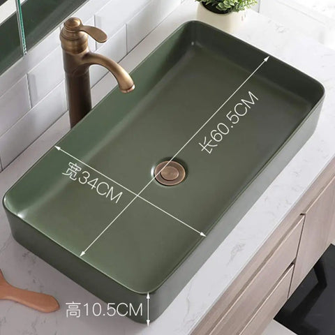 Top Shelf Matte Black Square Pedestal Bathroom Sink Deep Ceramic Washbasin shown above counter with dimensions 60.5x34x10.5CM.