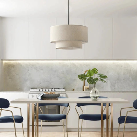 Two Tier Drum Pendant Light With Adjustable Hanging Wire above a modern kitchen table, featuring off white linen shade and black frame.