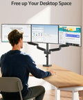Triple Monitor Desk Mount For Up To 27 Inch Screens, Heavy Duty Arm System With Each Arm Holding 4.4 To 19.8 Lbs, Vesa 75x75 And 100x100 Compatible, Fully Adjustable Triple Monitor Stand For Your Desktop Rig, Black displayed in office setup with three monitors, mounted on desk.