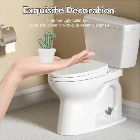 Ceramic Toilet Bolt Covers Decorative Bathroom Hardware Hand Painted Cactus Caps on hand next to toilet bowl.