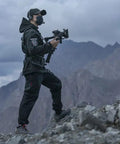Person wearing Lightweight Gimbal Support Vest For Long Shoots With Ergonomic Comfort And Expanded Contact Points Secure Dual Handles.