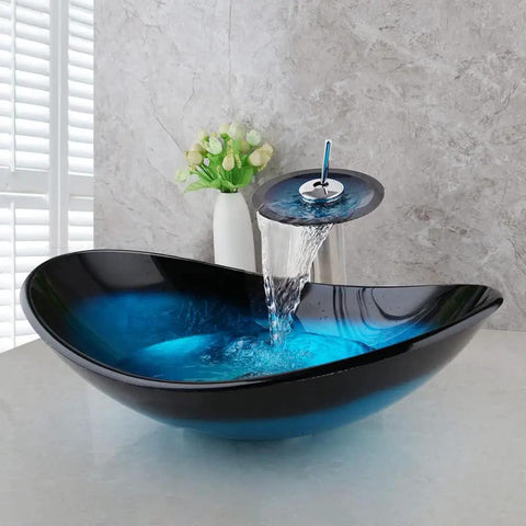 Slick Oval Blue Glass Vessel Sink 22x14 Inch With Waterfall Faucet And Pop Up Drain Tempered Glass Basin Top Mount Bathroom Sink Boat Shape Design For Apartment Bathrooms Vanities
