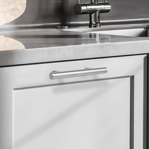 Set Of 25 Brushed Nickel Stainless Steel Cabinet Handles 2-1/2 Inch Center To Center 4 Inch Overall Length Modern Euro Style T Bar Pulls installed on white cabinet