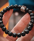Premium Tibetan Style Spacer Beads For Bracelets And Necklaces Diy Jewelry Crafting Supplies, black 9.5mm beads on a hand.