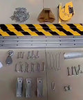Beefy Aluminum Rescue Tripod For Confined Space Operations With Two Six Zero Lbs Winch and Harness, assembly parts and tools laid out.