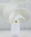 Front view of Ten Watt Micro Spiral Wind Turbine Generator With Archimedes Rose Design showcasing curved blades
