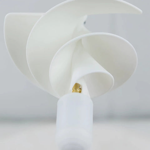 Front view of Ten Watt Micro Spiral Wind Turbine Generator With Archimedes Rose Design showcasing curved blades