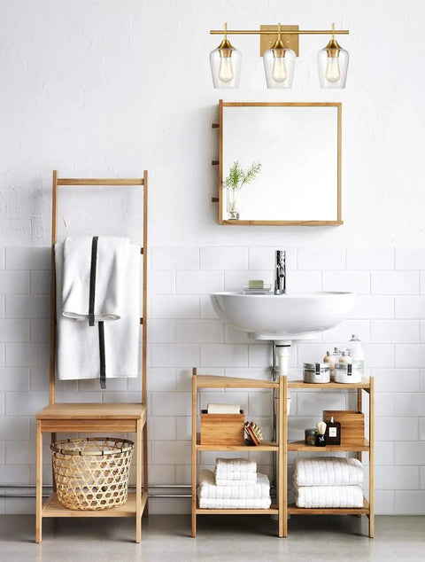 Industrial Bathroom Vanity Lights 3 Light Wall Sconces With Clear Glass Shades And Gold Finish above modern sink area