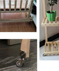Silent Furniture Caster 20kg Capacity TPE Wheel(1.5 Inch With Brake) on a wooden shelf with plants.