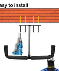 Overhead Garage Storage 4 Pack Hooks Set with drill, illustrating easy installation on brick wall.