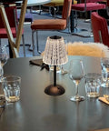 Cordless LED Table Lamp With 4000mAh Rechargeable Battery, 3 Color Modes And Stepless Dimming on restaurant table