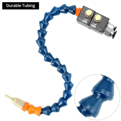 Mist coolant spray system for CNC machines; blue articulated tubing with orange fittings and brass nozzle.