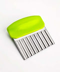 Green plastic-handled stainless steel crinkle cutter with a wavy blade.