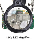 Desktop LED Magnifying Glass Soldering Station With Dual 3.5X And 12X Magnification, focus on magnifier lenses over PCB.