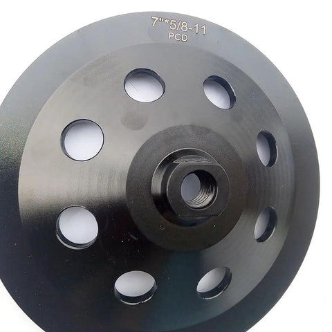 Close-up of 7 Inch PCD Grinding Wheel With 9 Segments For Removing Epoxy, Glue, Mastic, Paint And Concrete Floor Coatings 5/8-11 Thread