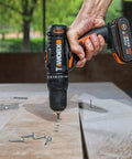 Heavy Duty Cordless Impact Drill Equipped With Killer Dual Speed Motor And 18 Precision Torque Settings For No Sweat Home Repairs And Rock Solid Construction Power in use on wood.