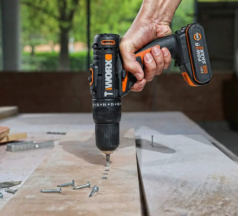 Heavy Duty Cordless Impact Drill Equipped With Killer Dual Speed Motor And 18 Precision Torque Settings For No Sweat Home Repairs And Rock Solid Construction Power in use on wood.