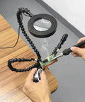 Hands using Must Have Handy Pro Tabletop Clamp Base Helping Hands Soldering Third Hand Tool with 3X LED Magnifying Glass
