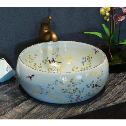 Bathroom Vessel Sink, Countertop Basin Bird Kitchen Basin Sink, Ceramic Sink with floral design, round shape.