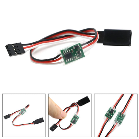 Front view of a 5–6V steering gear delay module with red, black, white wires and a small green PCB.