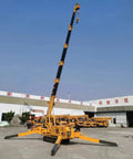 3 Ton Hydraulic Crawler Crane Portable Folding Electric Lifting Rig With No Sweat 360 Turn, outdoor setup, yellow crane, extended arm.