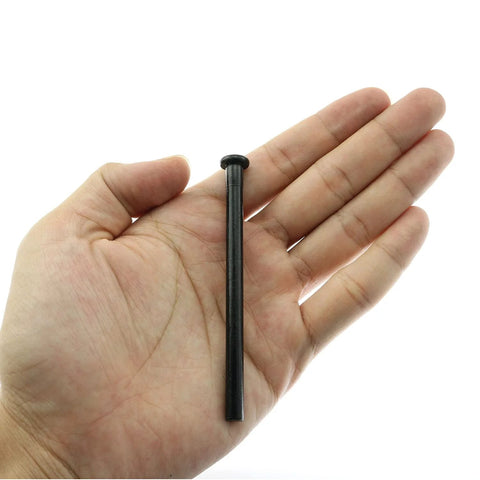 Black metal door hinge pin, 3.5 inches long, shown held in a hand.