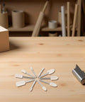 40 Piece Wool Felt Polishing Wheel Set With One Eighth Inch Shank for drill buffing attachments on wooden surface