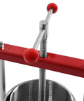 Close-up of 1.6 Gallon No Sweat Manual Press for Fruit Wine and Cheese, metal body and red handles visible, designed for clean juice extraction.