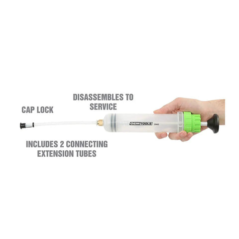 Hand holding Compact 200cc Fluid Extractor and Filler Pump with extension tubes, showing disassembly and cap lock.