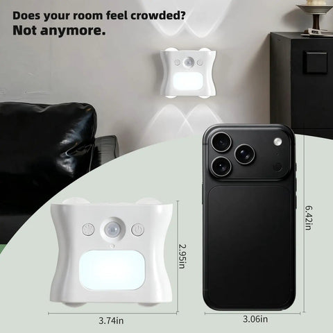Motion Sensor Light Indoor with Remote, Rechargeable Wireless LED Sconce on wall with phone for size reference.