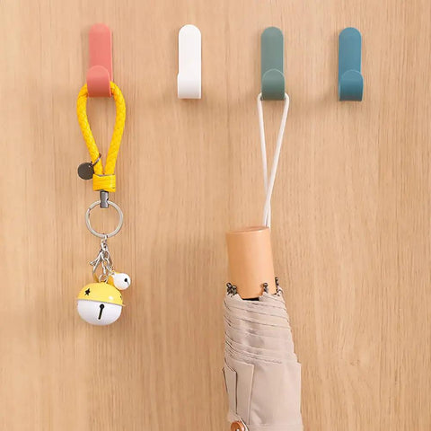 Colorful Nordic Style Easy Install Self Adhesive Wall Hooks 6 Pack For Keys Hats Towels Shower And More Decorative Key Holder Rack For Kitchen Living Room Office Anywhere showcasing a keychain and umbrella hanging on colorful hooks.