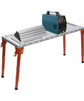Badass Heavy Duty Portable Welding Table With Slick Swivel Wheels And Four Foldable Legs For Precision Grid Setup Knockout 1k Load Rating with metal rods and welding machine.