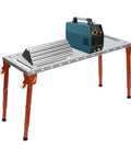 Rock Solid Foldable Welding Bench With Killer 1000 Lb Load Rating And Smooth Height Adjustments From 13 To 21 Inches showing welding machine and metal pipes.