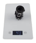 One Inch Double D Steering Universal Joint Shaft Black 83mm Long U Joint on digital scale showing 473g