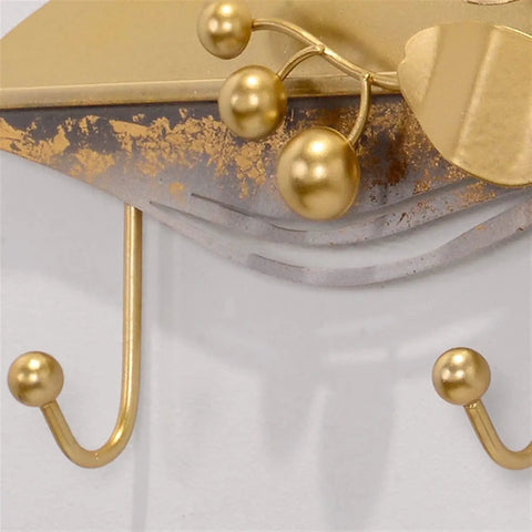 Heavy Duty Wall Mount Coat Hooks For Entryway And Closet, Tough As Nails metal rack with gold finish and smooth hooks.