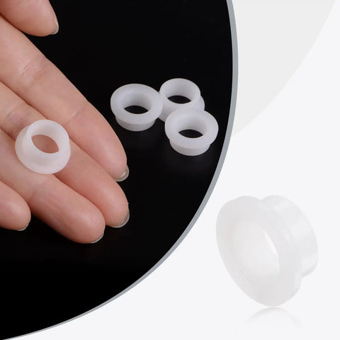 Close-up of white plastic nylon flanged sleeve bearings, 12 Pack Flanged Sleeve Bearings Plastic Bushings Nylon White Bore 10mm By 13mm OD By 6.5mm Length Flange 16.5mm Self Lubricating High Load Nylon Bushings Low Maintenance for DIY Projects and Machinery, shown in hand for size reference.