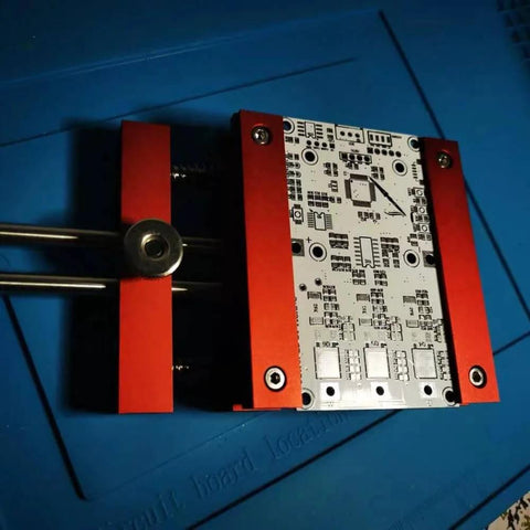Beefy Heavy Duty Welding Fixture For PCB Circuit Boards With Aluminum Alloy Clamp in red finish, holding a circuit board