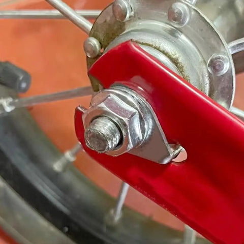 Close-up of bike wheel with 8 Piece Bicycle Wheel Hub Safety Washers Set With Thickened Anti Skid Pattern 4 M8 And 4 M10 Galvanized Iron