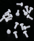 Built Tough Top Shelf M2.5 Hex Nylon Standoff Spacer Kit Featuring 200 Pieces Of Assorted Male And Female Mounts Screws And Nuts For Professional Tech Builds Daily, white nylon screws on black background.