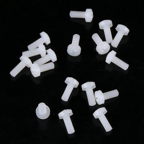 Built Tough Top Shelf M2.5 Hex Nylon Standoff Spacer Kit Featuring 200 Pieces Of Assorted Male And Female Mounts Screws And Nuts For Professional Tech Builds Daily, white nylon screws on black background.