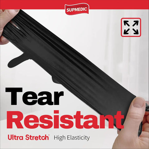 Tough As Nails Black Nitrile Disposable Gloves Hundred Count Five Mil Thick Powder Free Latex Free Safety Gear held in hand showcasing tear resistance.